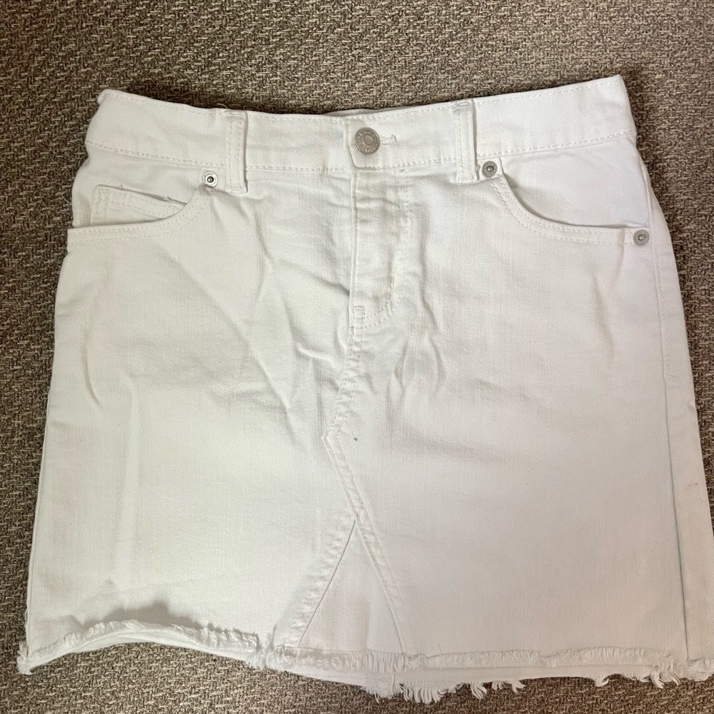 Girls white jean skirt. Distressed look. Size L. 10/12